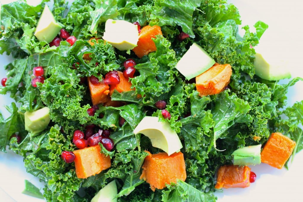 kale, sweet potato, pom salad closeup