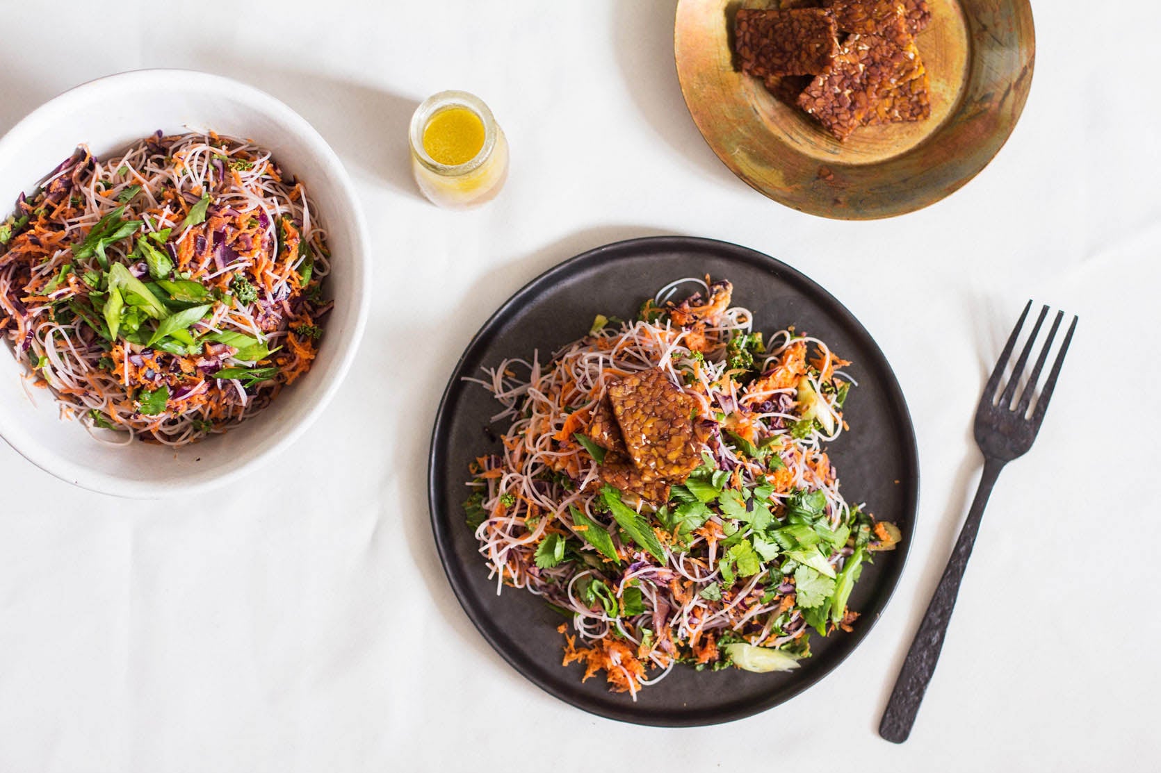 Kelp Noodle and Cabbage Salad with Seared Tempeh and Carrot Orange Miso Dressing