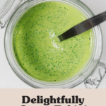An overhead image of a very bright green sauce, stored in a jar.