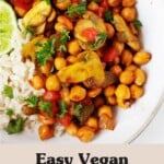 An overhead image of a vegan chickpea scramble, which has been seasoned with red chili powder and other spices. It is garnished with chopped parsley.