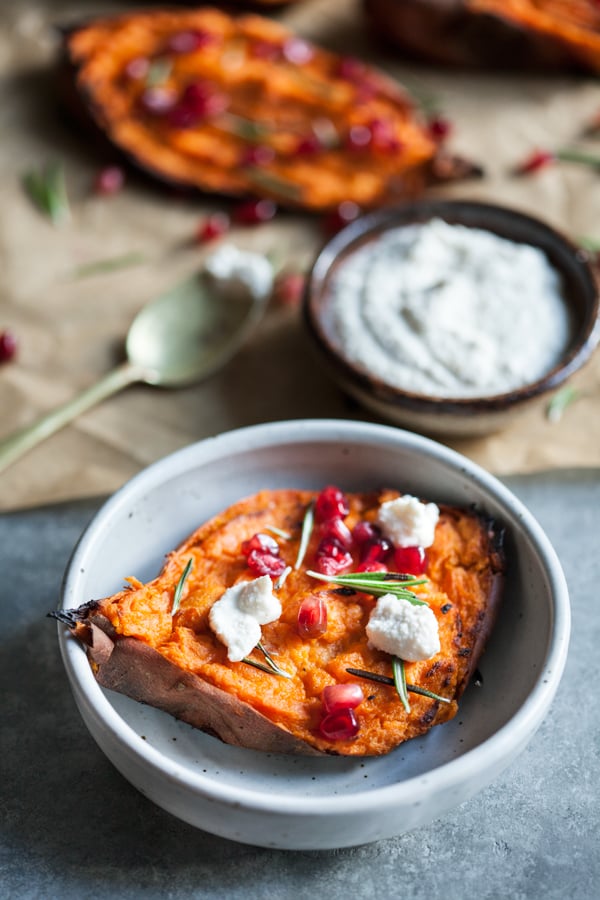 Twice baked, stuffed sweet potatoes with creamy macadamia ricotta: a decadent and festive #vegan side dish! | The Full Helping