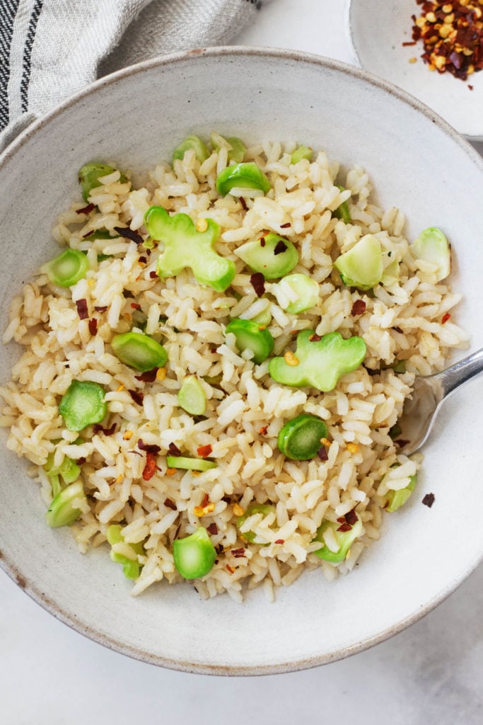 A simple, vibrant plant based stir fry made with broccoli stems and brown rice.