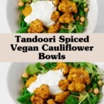 An overhead image of a bed of greens topped with tandoori spiced cauliflower, chickpeas, and a creamy sauce.
