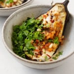 A sumptuous, plant-based stuffed eggplant with bulgur, currants, and pine nuts