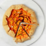 An overhead image of a festive, savory galette made with sweet potatoes.