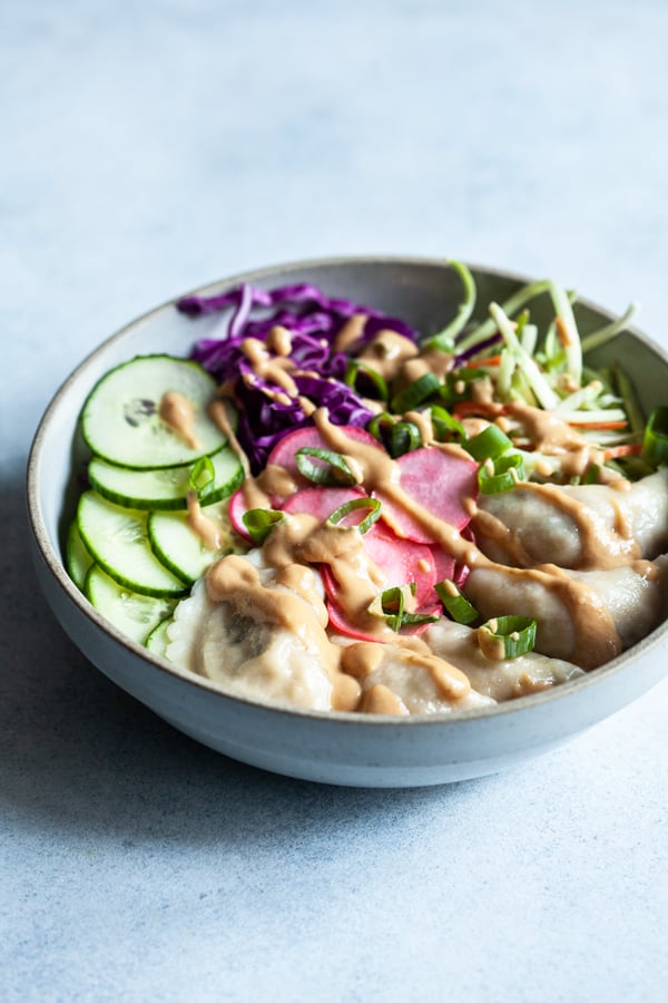 Vegan Dumpling Bowls with Quick Pickled Radishes & Almond Miso Sauce