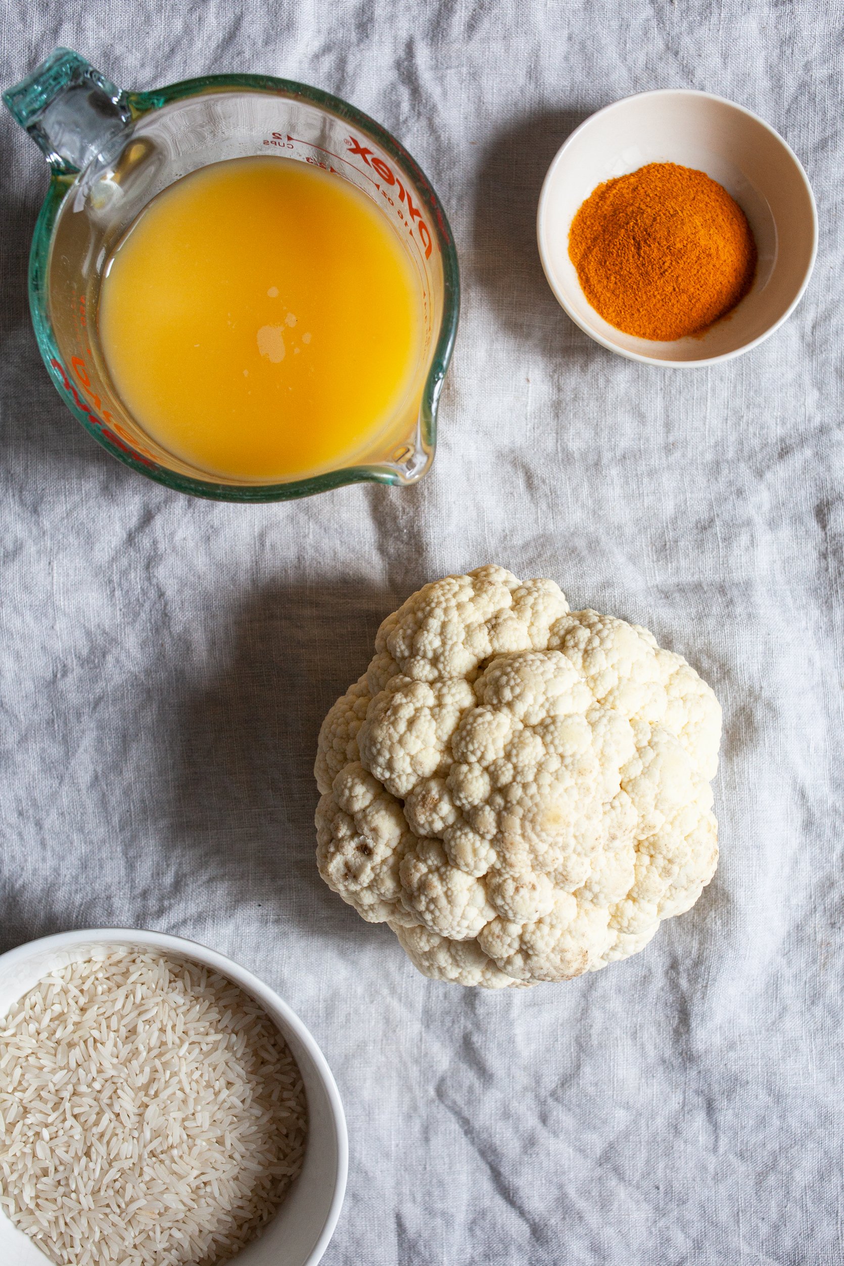 Cauliflower Steaks with Citrus Scented Rice and Creamy Orange Juice Turmeric Sauce | The Full Helping