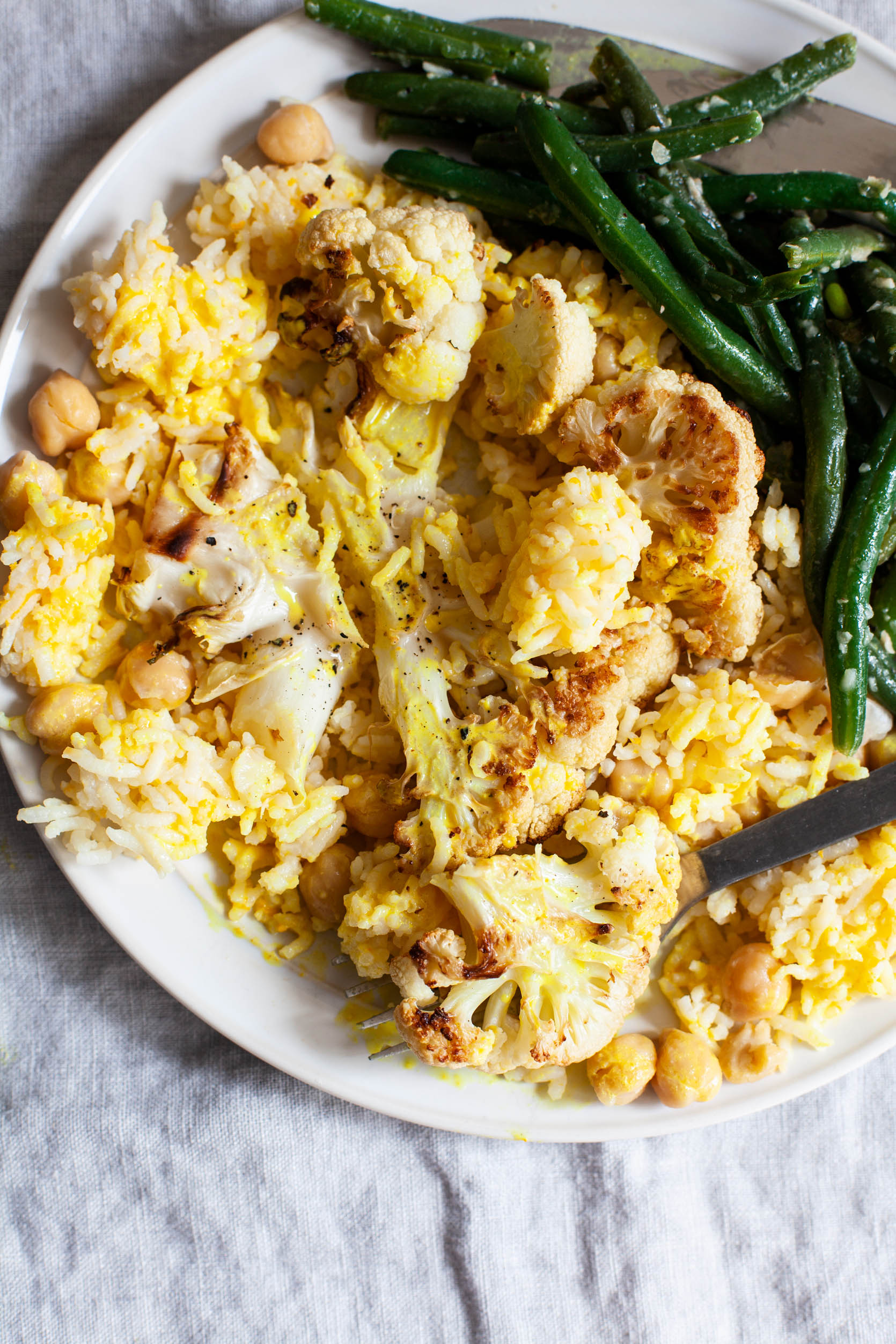 Cauliflower Steaks with Citrus Scented Rice and Creamy Orange Juice Turmeric Sauce | The Full Helping