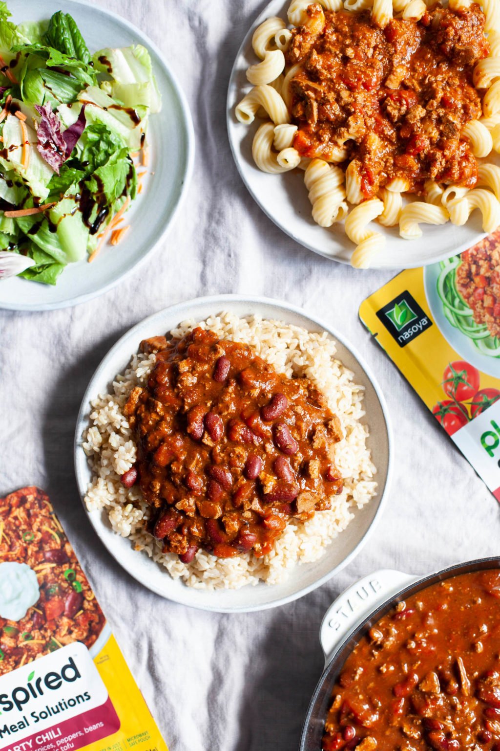 An assortment of plant-based meal options have been laid out for dinner, made with Nasoya's Plantspired Meal Solutions.