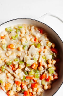 A savory skillet meal with carrots, celery, chickpeas, and a creamy sauce