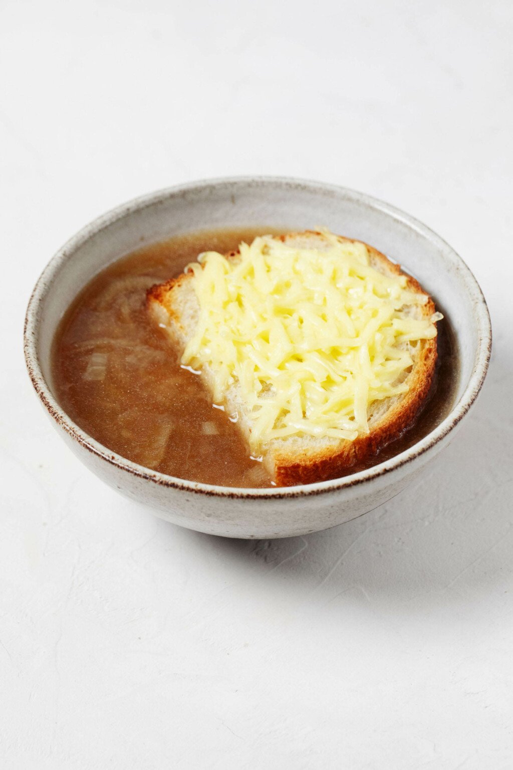 An image of a bowl of French onion soup.