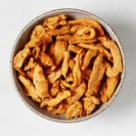 An overhead image of a ceramic bowl, which has been filled with a vegan protein.